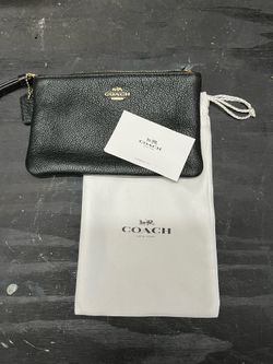 Coach black pebbled leather wristlet