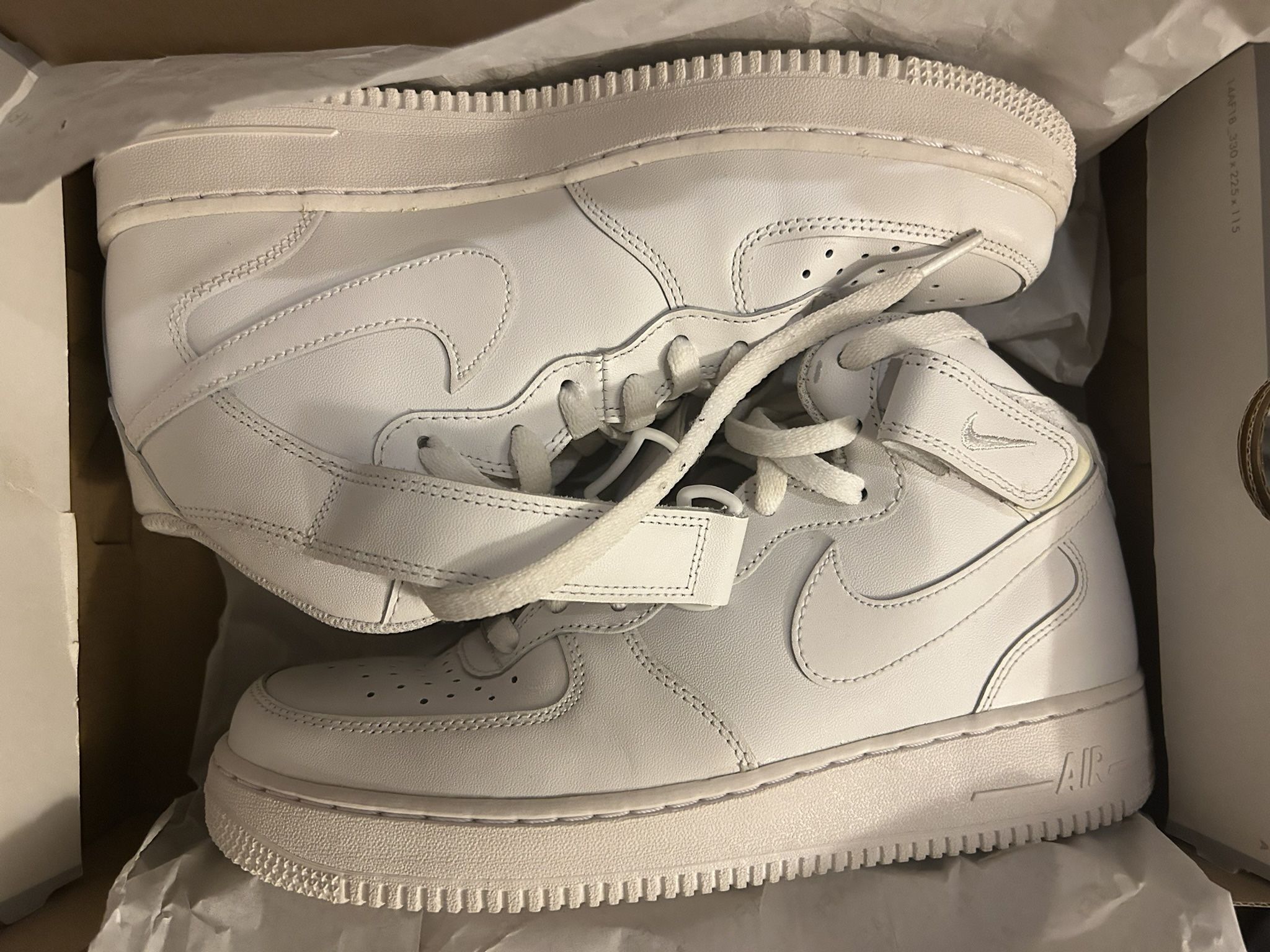 3 Different Pairs Of Shoes