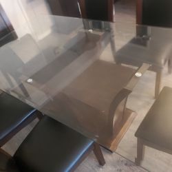 Glass Dining Table 6 Wooden and Leather chairs