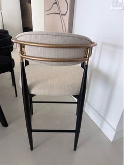 one BRAND NEW counter height bar stool