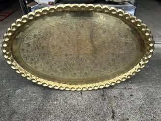 Very large brass serving platter in great shape. Would be something that would be used for a banquet, but it’s our so decorative. I don’t think it’s s