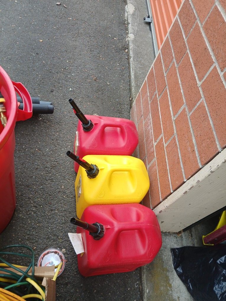 Landscape Bundle Includes 3 Gas Cans 1 Garbage Can Heavy Duty Hose Electric Hedge Trimmer 2 Blowers Sprinklers