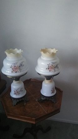 Two antique lamps hight 17 inch and 8 inch wide .ligth both on and top