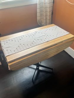Dining table with drop leaf sides