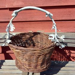 For Sale  Wicker wood and metal  Handle with leaves Basket  $25