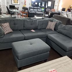 Gray sectional with pinheads