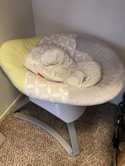 Grey/white/green baby soother
