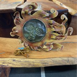 Unique Metal Sun with a light bulb