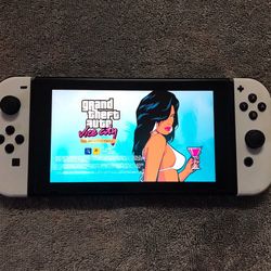 NINTENDO SWITCH with 100 POPULAR SWITCH GAMES