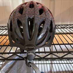 Pink And Black Bike Helmet