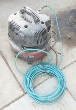 Air compressor with hose