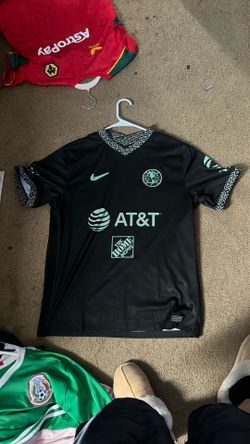 5 soccer jerseys sizes small ,medium,and large and soccer ball and soccer trophies and soccer cleats size 7 in a half,also a soccer pump