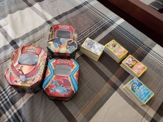 Huge lot of random pokemon cards & tins