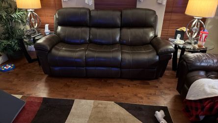 Leather  reclining sofa and love seat