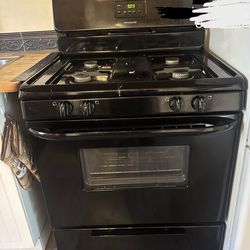 4 burner Fridgaire gas stove
