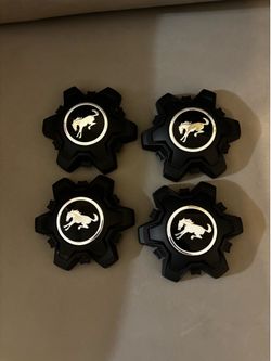 Set of 4 new Ford Bronco sport OEM wheel center caps