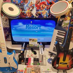 Huge Nintendo Wii Rockband Guitar Hero Drums Super Mario Kart Resort Video Games