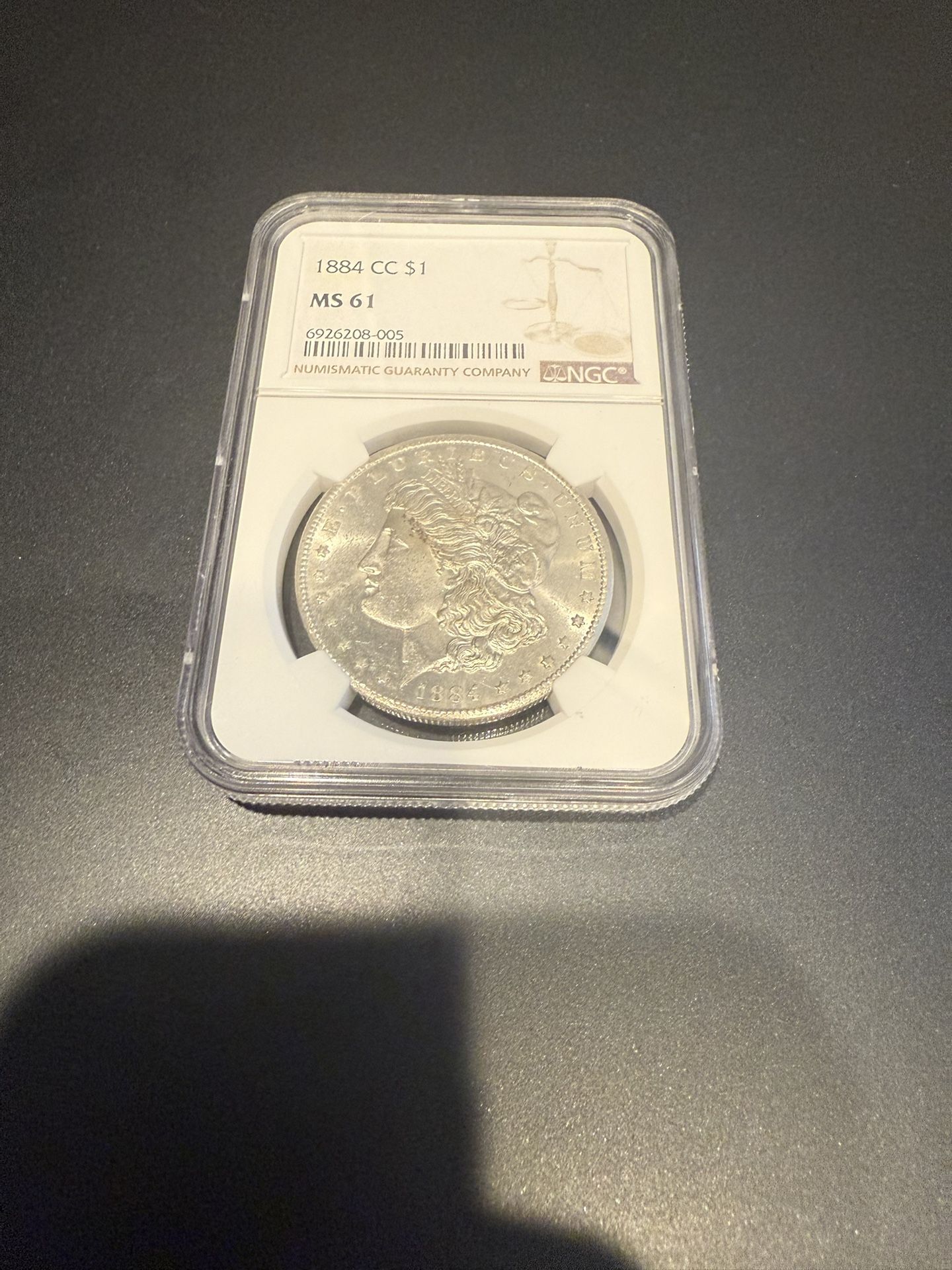 1884 CC Morgan Silver Dollar MS61 NGC