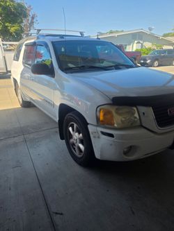 2004 GMC envoy with a 137000 miles
Together