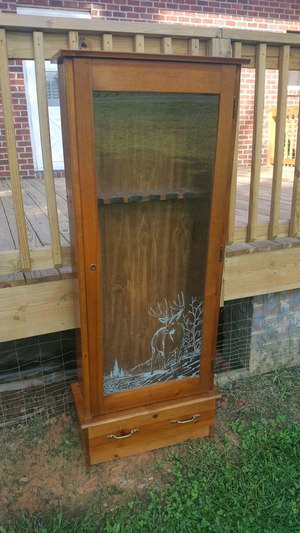 Gun with glass front and drawer. It has 2 locks for Sale in