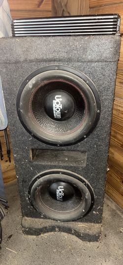 Two 12” uptown audio subwoofers and 2000w hifonics amplifier