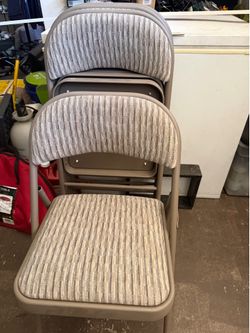 Brand new set of 4 Samsonite folding dining chairs