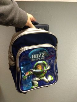 Small buzz lightyear suitcase on wheels with extension handle