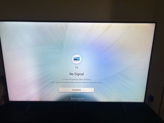 65 Inch UHD Samsung Roku Tv with remote.