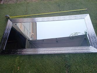 Chrome beveled dressing mirror 65 inches long by 32.5 wide