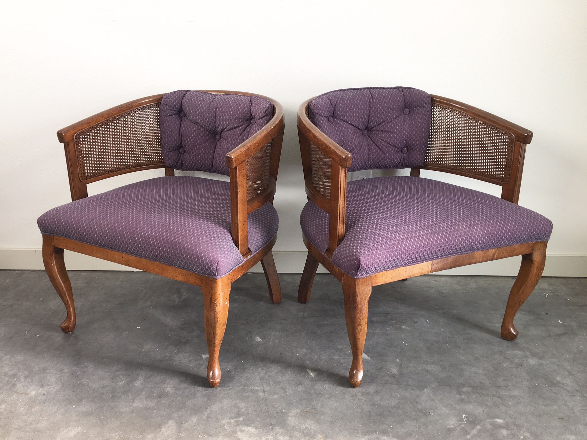 Pair of vintage cane barrel chairs in purple.