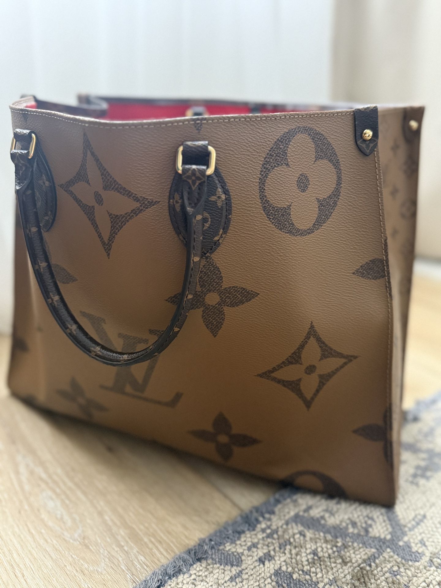 Louis Vuitton On The Go GM Handbag