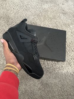 Jordan 4 “Black cat”