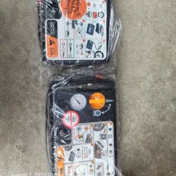 Vehicle tire air pump (Ford OEM) with built in sealant. Two available, $75 each