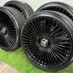 New 26 inch gloss black wheels with cadillac floating caps and atturo 305/30r26 tires