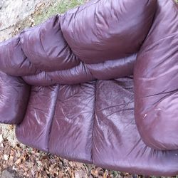Free three-seater brown leather sofa