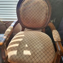 Two Wooden Arm Chairs