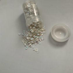 Iridescent White Sequins in Clear Bottle