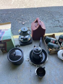 Coleman camping lanterns,pots & pans, gas bottles also portable camping stove that is used,