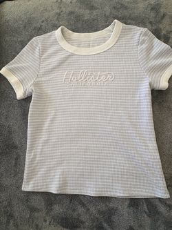 Light blue and white striped waffle-knit Hollister California baby tee with white ringer trim