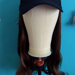 Brown heat resistant synthetic wig with baseball cap attached Brown heat resistant synthetic wig with baseball cap attached