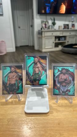 Connor McGregor, Dominick Cruz, & Dan Ige 2024 Topps Finest Aqua Glitter Refractor Lot