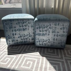 Two Blue Patterned  Ottomans 