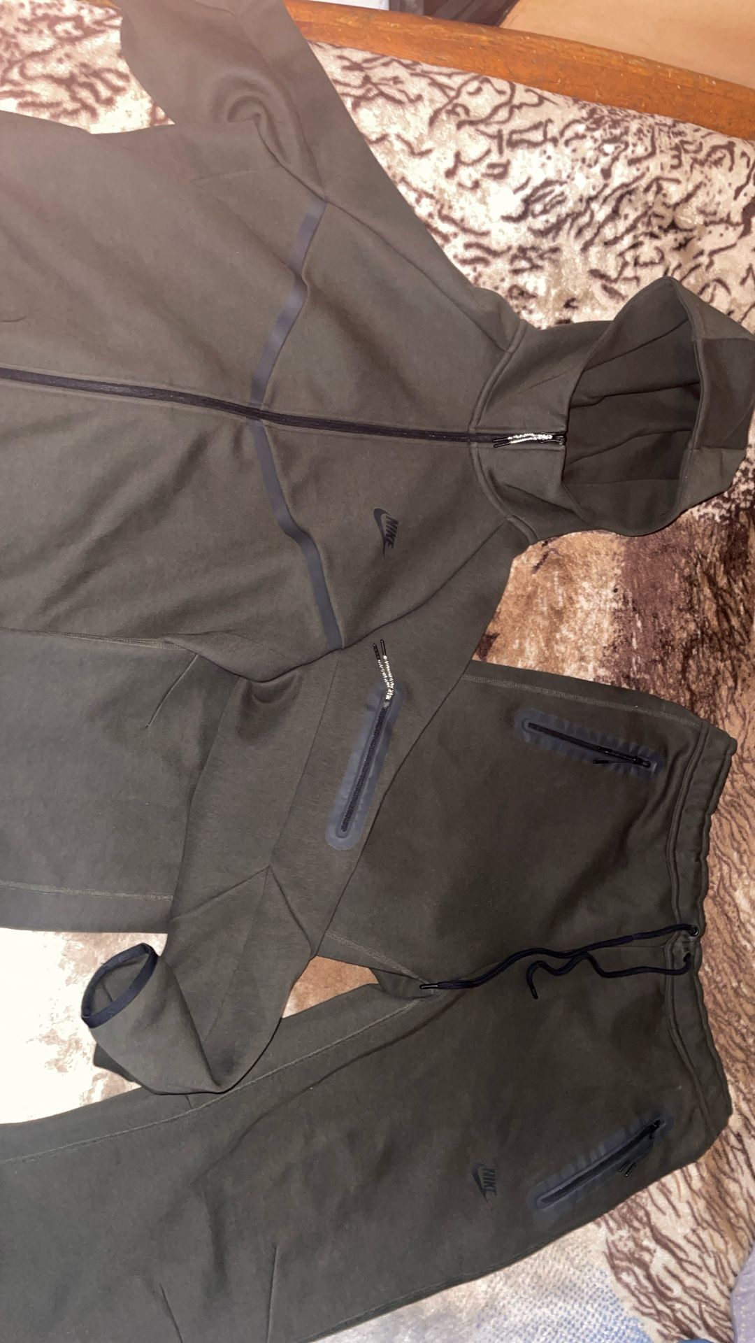 Green Nike tech suit