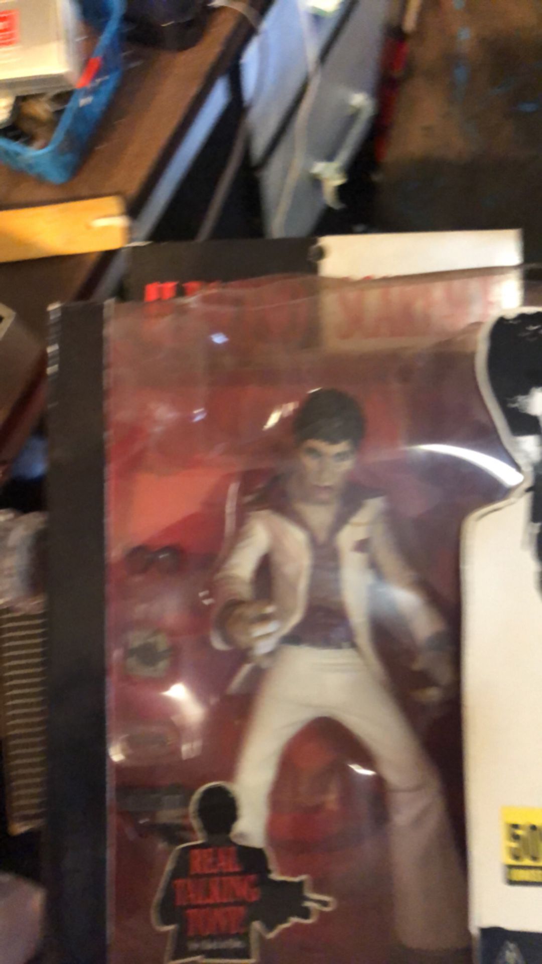 Scarface action figure and poster