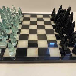 Obsidian and Glass Chess Set / Marble Board. Pieces in Great minor scratches on board. Heavy 13.5”
