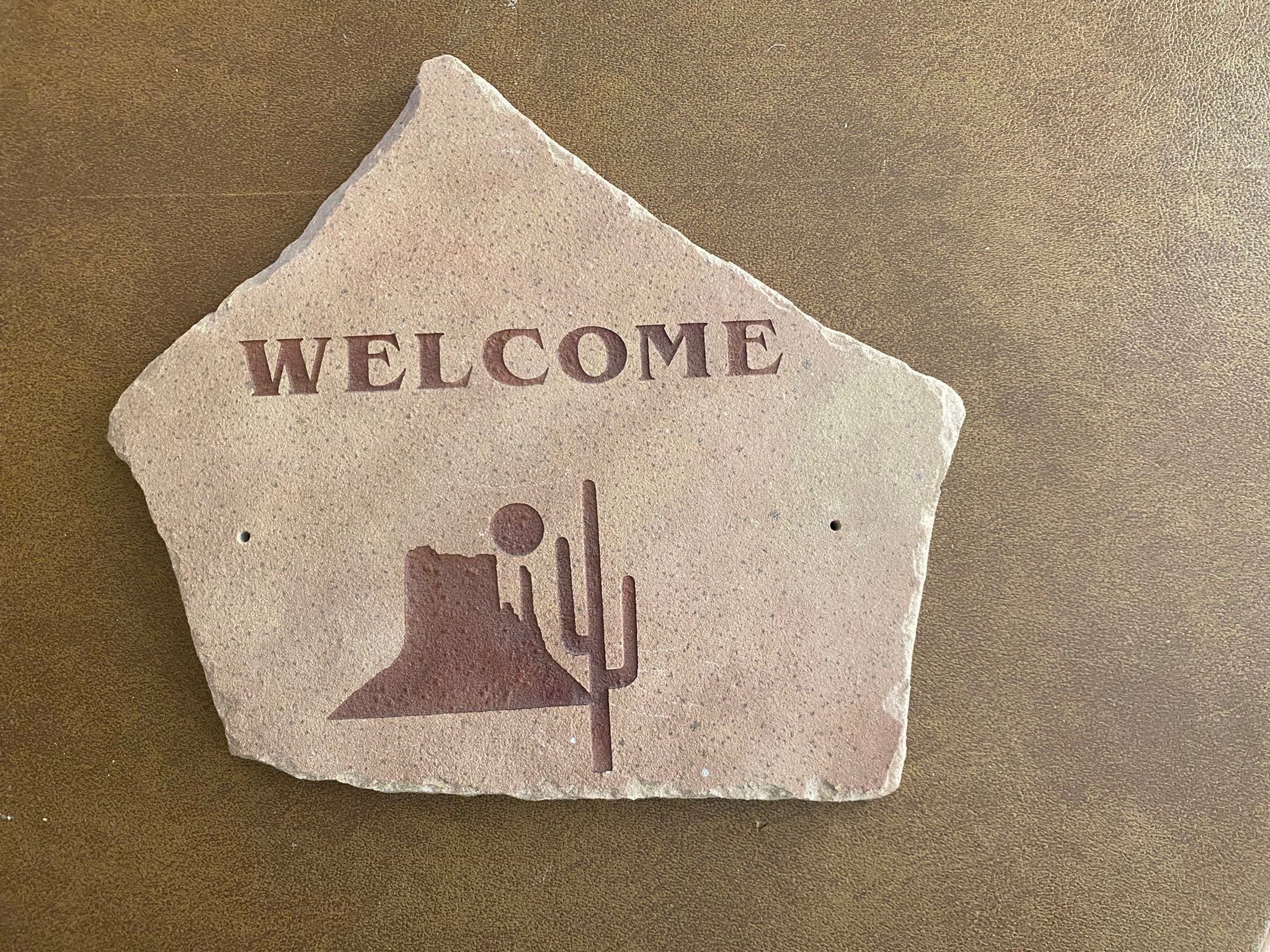 Flagstone welcome sign where is sunrise design