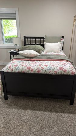 Solid wood dresser, nightstand, and full size bed frame with mattress.