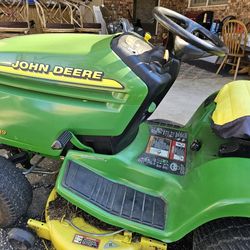 JOHN DEAR RIDING Lawn Mower  $2,000.00