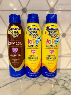 Protective Banana Boat sunscreen spray: 6 oz bottle of SPF 15 Banana Boat Protective Dry Oil with coconut oil OR 6 oz bottles of SPF 50+ Banana Boat K