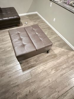 Large Tufted Leather Ottoman with Casters